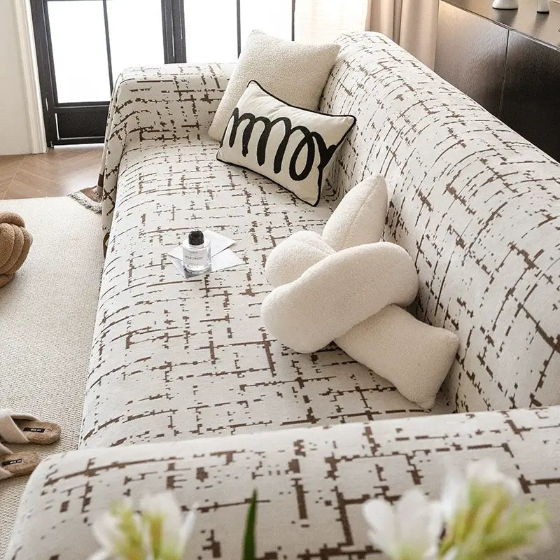 Durable chenille couch cover, anti-scratch and breathable, all-season furniture protector for a tidy home.