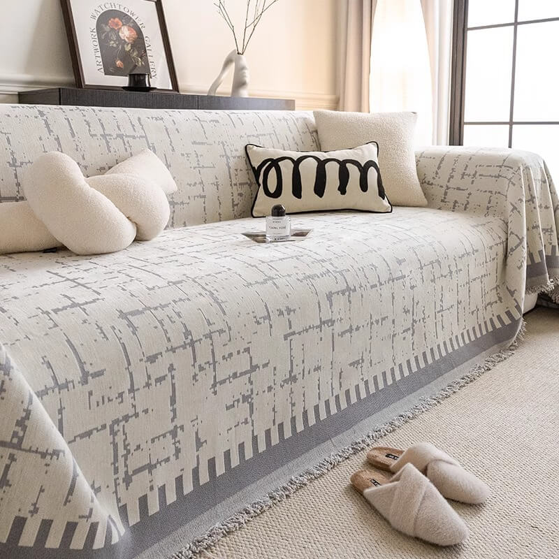 Beige chenille couch cover, breathable and anti-scratch, perfect furniture protector for pets and all season use.