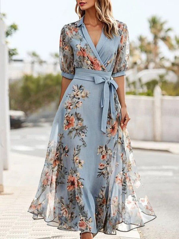 Women's light blue floral print V-neck wrap midi dress, an elegant sundress ideal for parties & wedding guests.