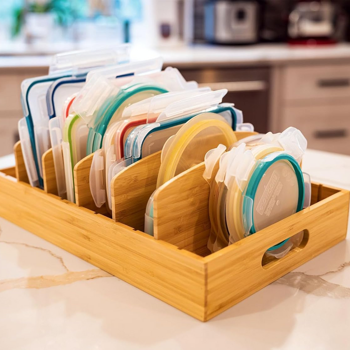 Bamboo kitchen organizer for lids, optimizing cabinet space. A smart home essential for kitchen storage.