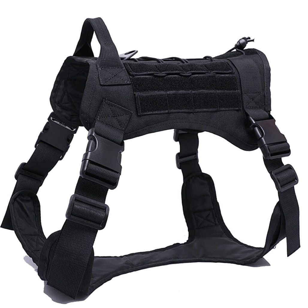 Man's hand holding top handle of an adjustable tactical dog harness, pet gear