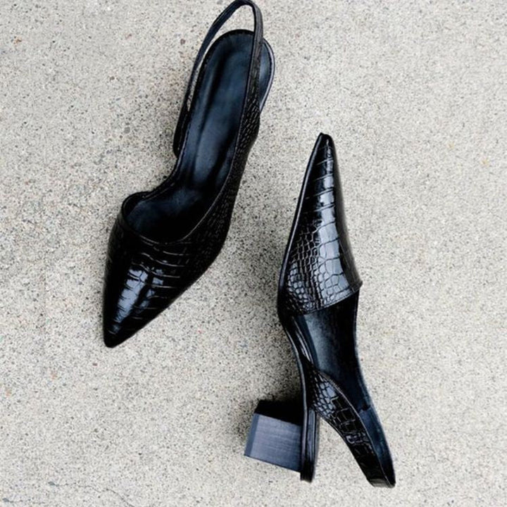 Lightweight women's black loafers with cushioned support, offering all-day comfort. Formal & stylish elegant dress heels.