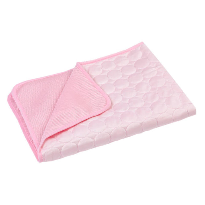 Textured surface of a self-cooling pet mat for enhanced animal accessories and comfort