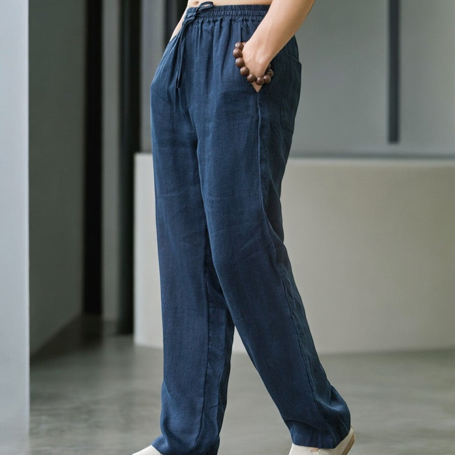 White men's relaxed fit summer pants, breathable & comfortable for hot weather lounging.