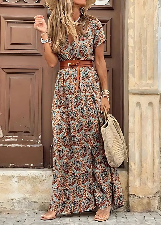 Women's V-neck floral maxi dress with short sleeves and a chic side split, ideal for summer fashion.