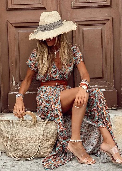 Stylish women's floral V-neck maxi dress, short sleeve design, and fashionable side split, vacation ready.