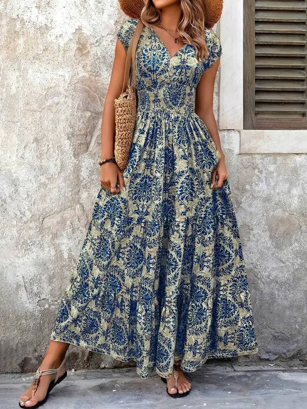 Bohemian style long maxi dress for women with a flattering V-neck, offering chic, relaxed fashion.