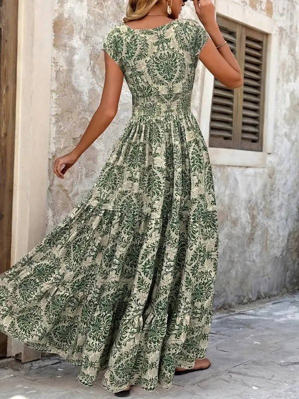 Flowy V-neck women's maxi dress, essential resort wear with a bohemian flair for ultimate comfort.