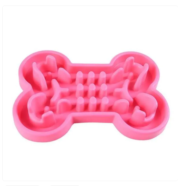 Close-up of a dog slow feeder bowl with bone design, promoting healthier eating