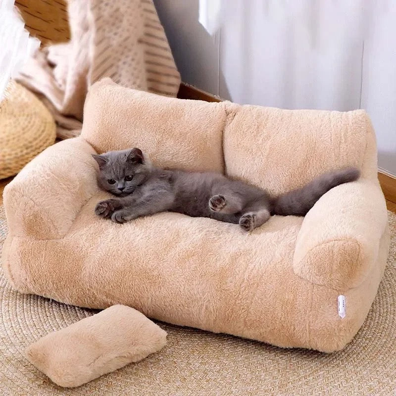 Brown cat sofa lounge bed with elevated sides for feline comfort and support, washable cover.