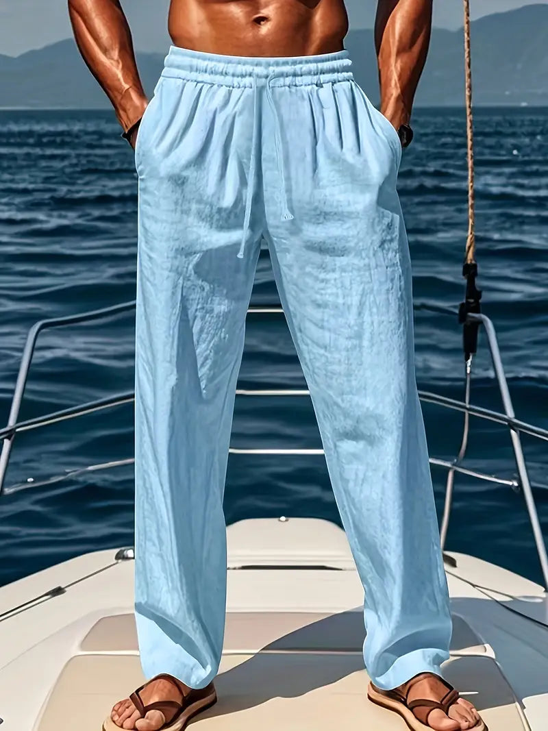 Stylish men's straight leg casual pants featuring an elastic drawstring waist and loose fit.