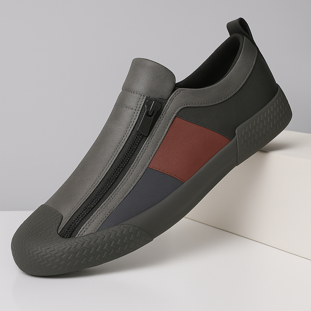 Men's color block sneakers on foot, demonstrating comfortable fit & modern style.