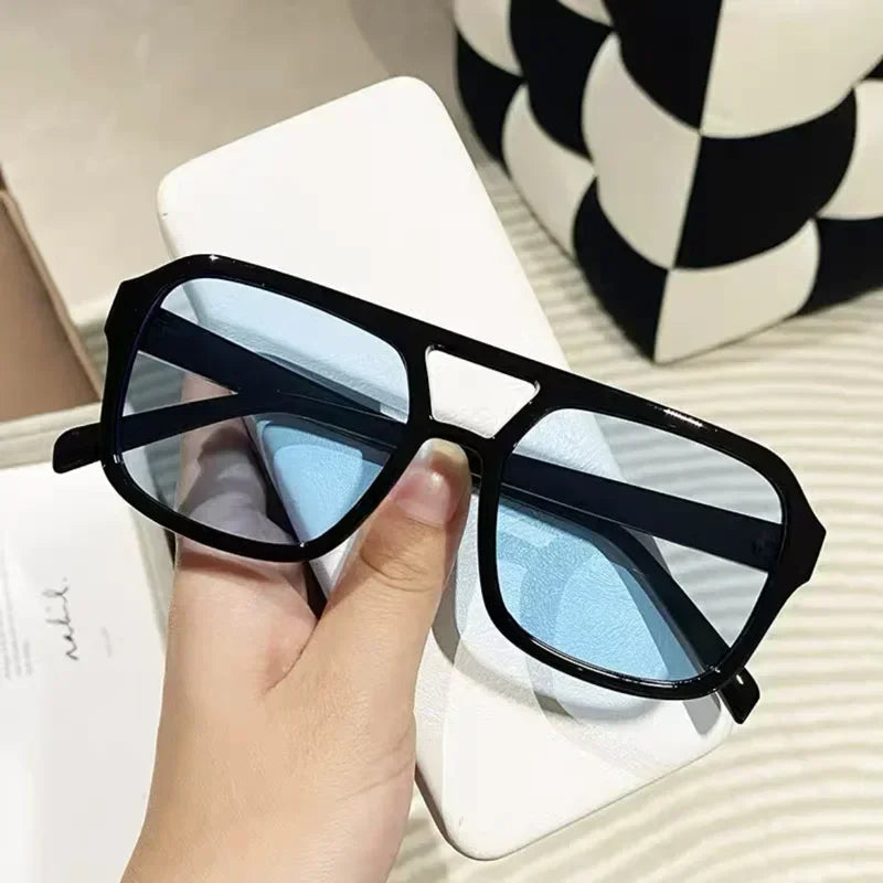 Modern retro square sunglasses for women. Stylish eyewear with colored lenses & UV400 UV protection.