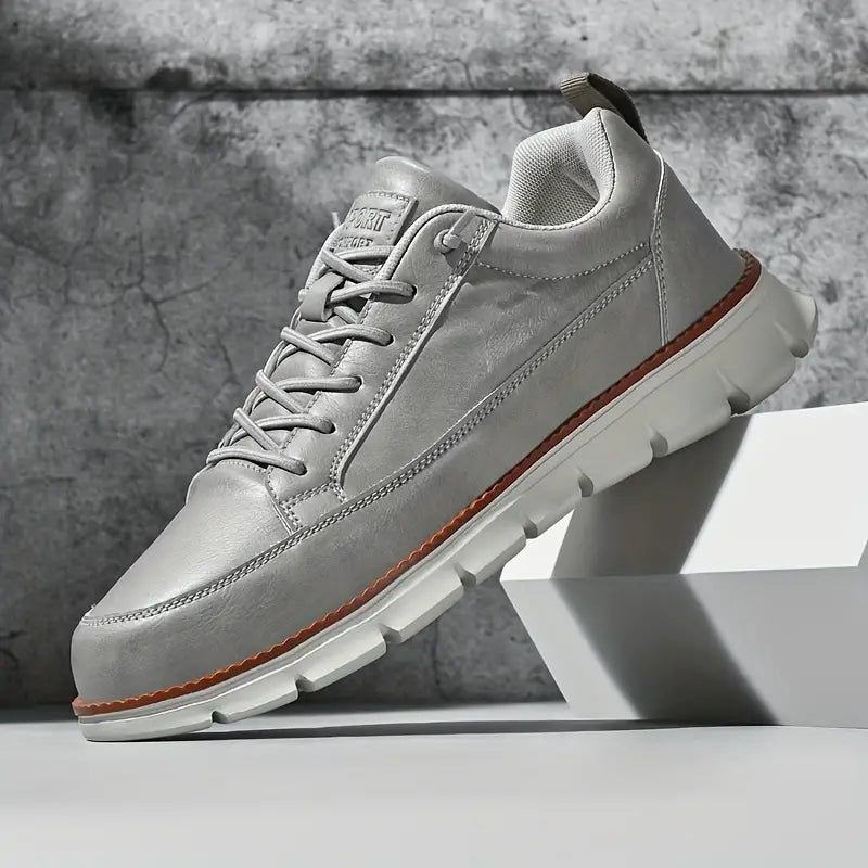 Mens athletic-inspired casual sneakers. Comfortable low-top footwear, perfect for smart casual & everyday wear.