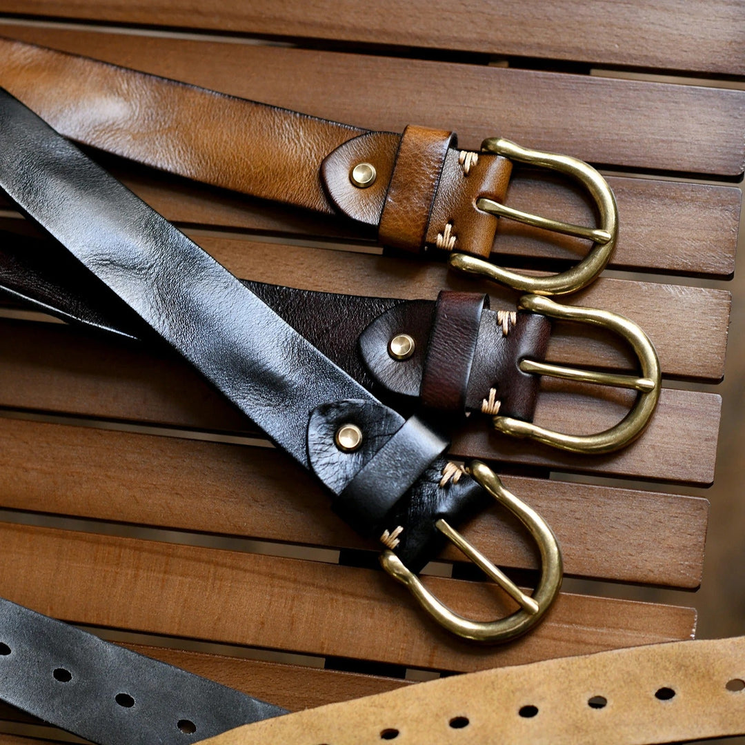 Hard-wearing men's full-grain leather belt. Stylish cowhide accessory for a refined formal or casual look.