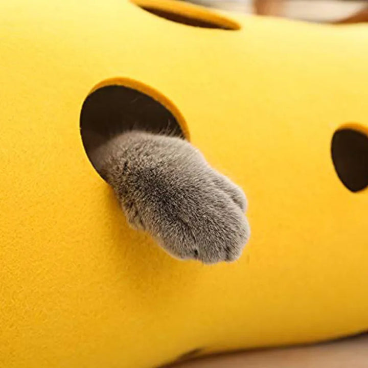 Gray felt cat play tunnel with multiple peek holes, promoting interactive enrichment for cats, flexible design.