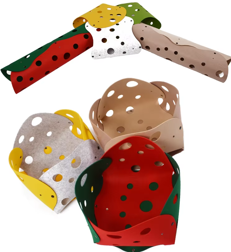 Black cat crouching inside a flexible interactive play tunnel, ready to pounce from a peek hole.