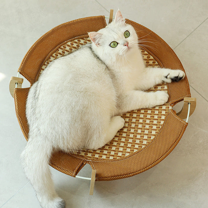 Woven rattan cat hammock bed, keeping pets cool with its breathable design.