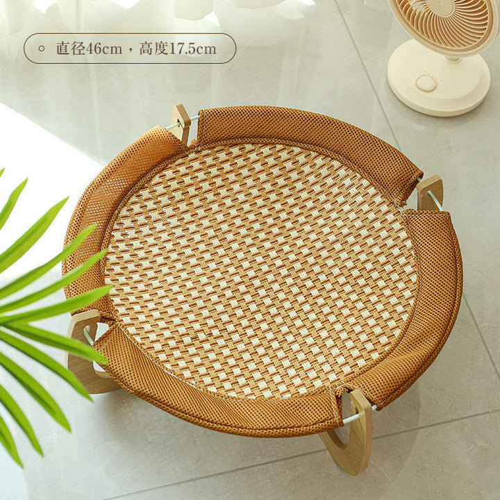Elevated cat rattan cooling bed, perfect for summer pet comfort and airflow.