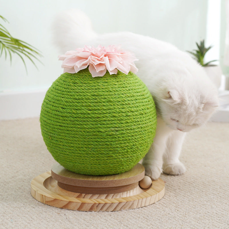 Cat scratching cactus tower with multiple sisal posts and interactive hanging toy.