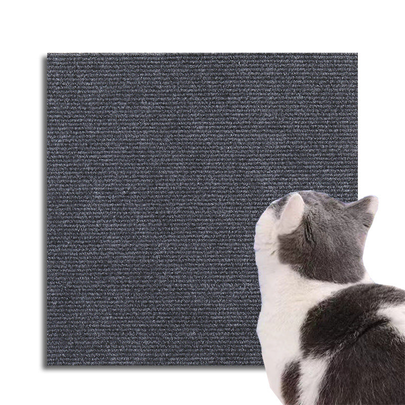 Adhesive cat scratch guard blending seamlessly with sofa, showing paw protection