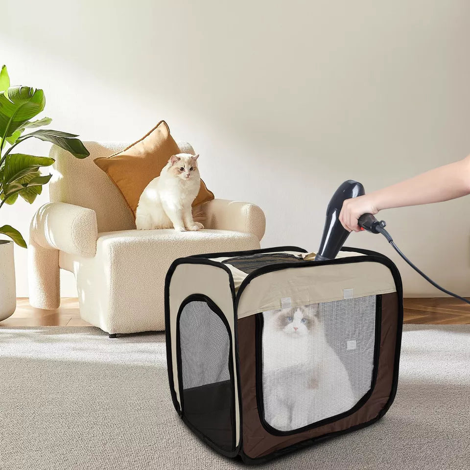 Collapsible pet carrier for cats & small dogs, ideal for car travel, featuring durable construction.