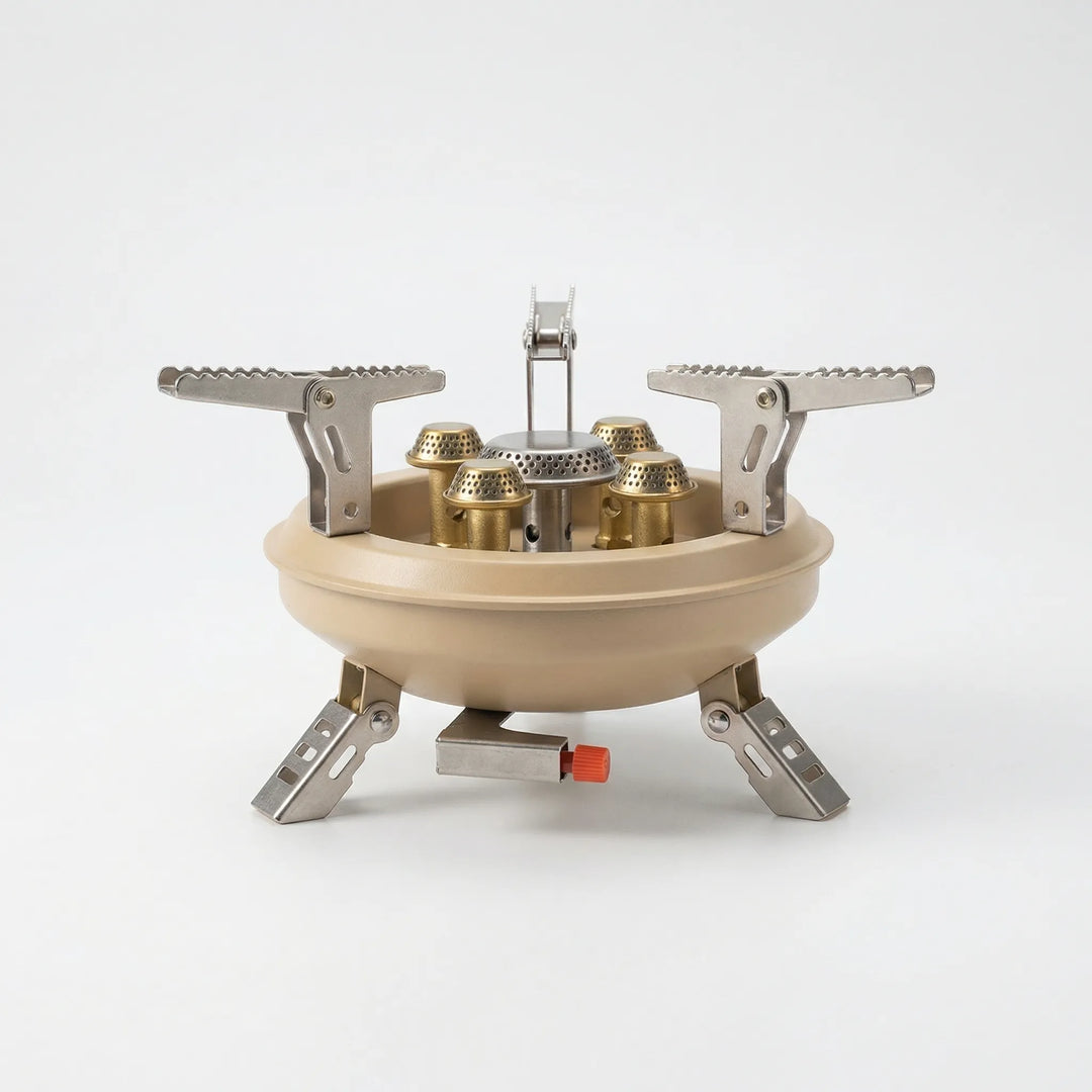 Portable butane camping stove with wind shield and piezo ignition, perfect for backpacking and travel cooking.