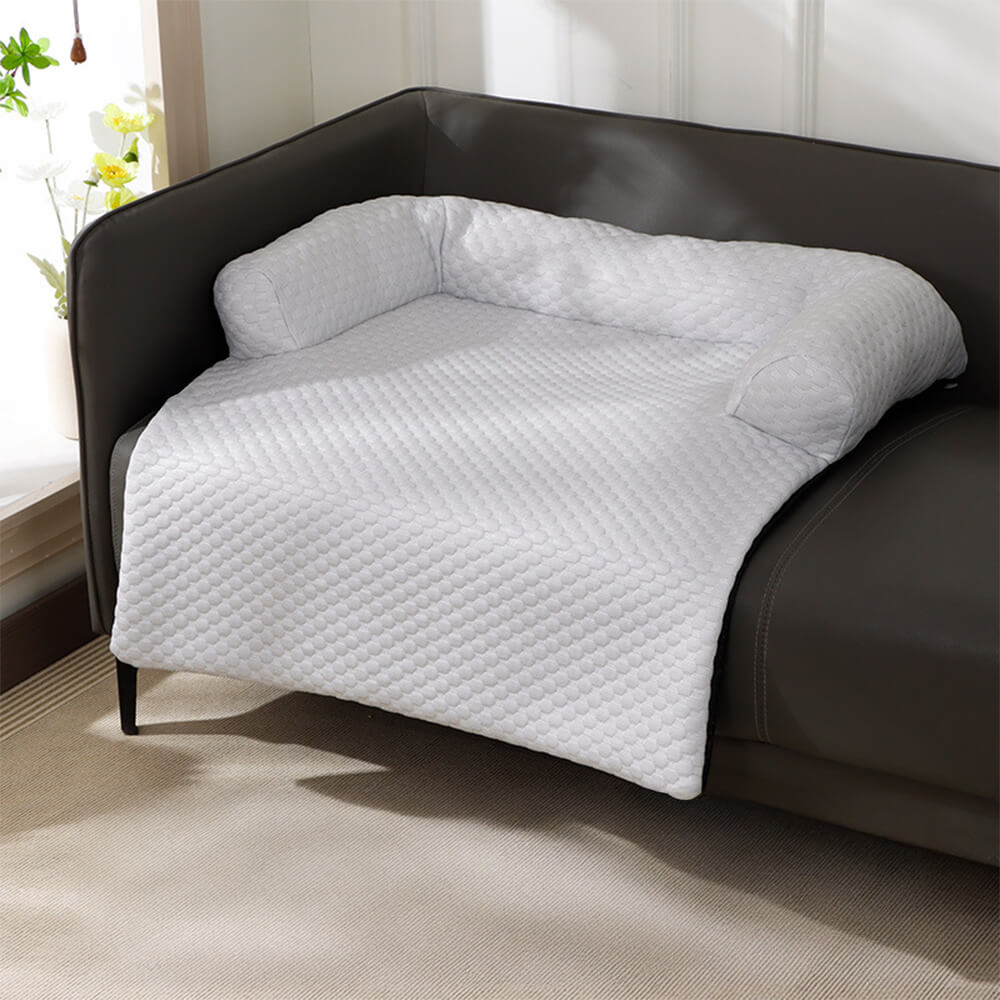 Pet sofa cover with cooling technology, offering a comfy spot for dogs & cats.