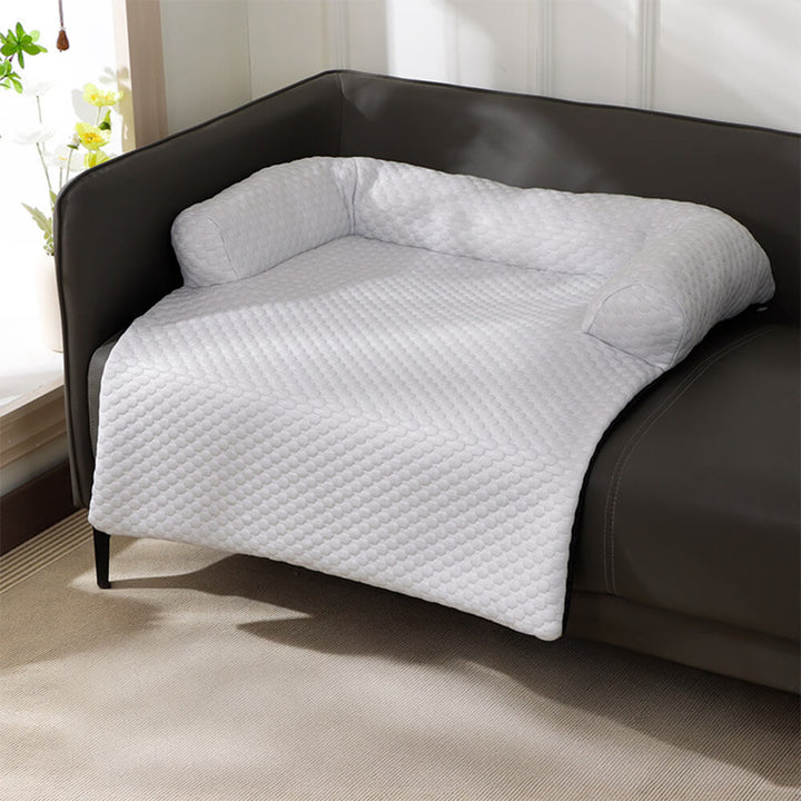 Pet sofa cover with cooling technology, offering a comfy spot for dogs & cats.