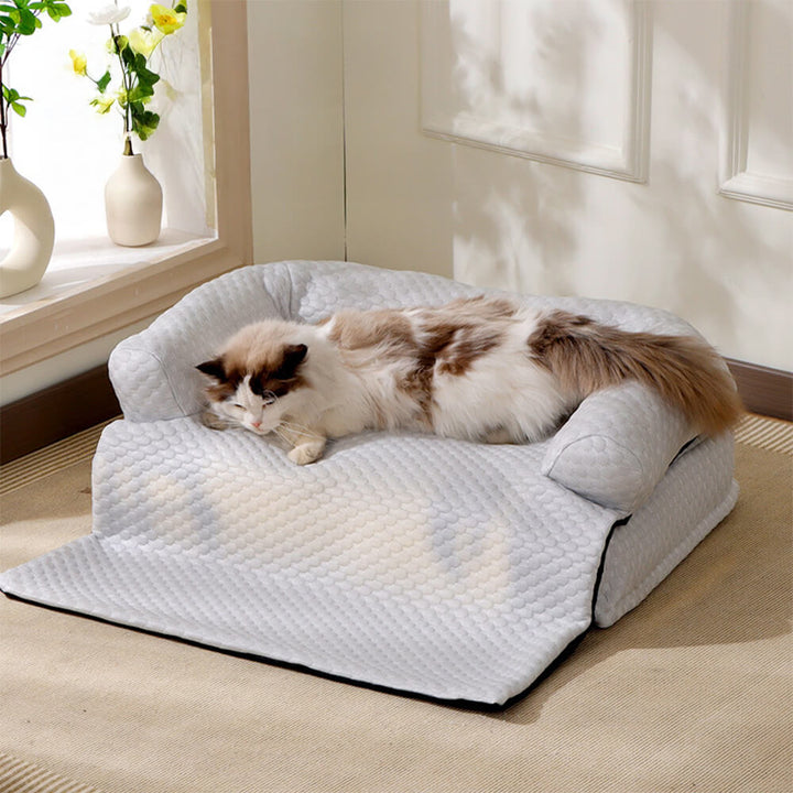 Close-up of the cooling fabric on a pet couch cover, ideal for dogs & cats.