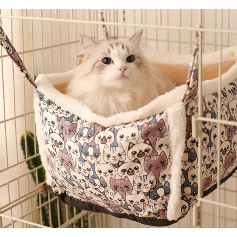 Plush cat bed with an adorable animal pattern, perfect for a relaxing and warm sleeping spot.