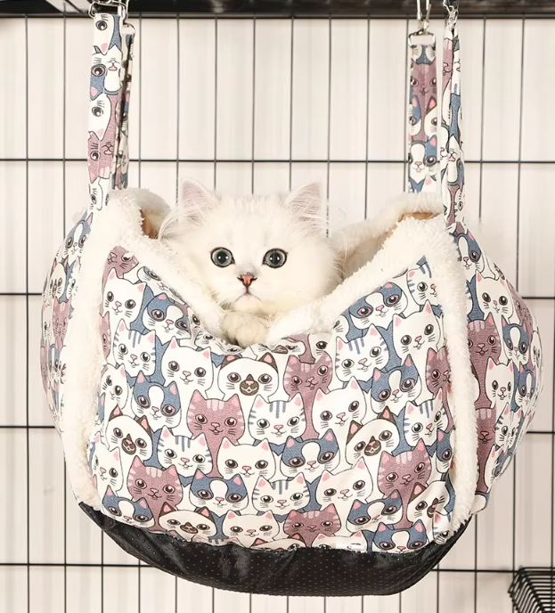 Washable cat bed, a soft pet house with an inviting, cozy design and cute paw print pattern.