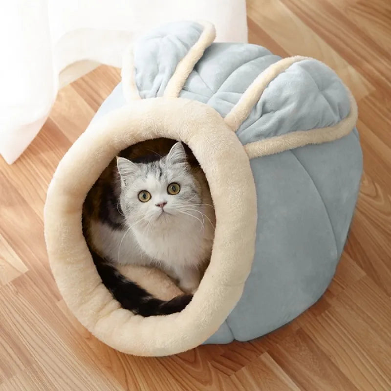 Cozy cat bed with unique pink ear design for ultimate pet comfort and hideaway