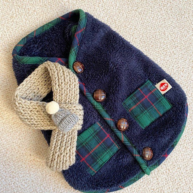 Pet cold weather gear: Red plaid fleece dog vest and scarf, ensuring winter warmth & style.