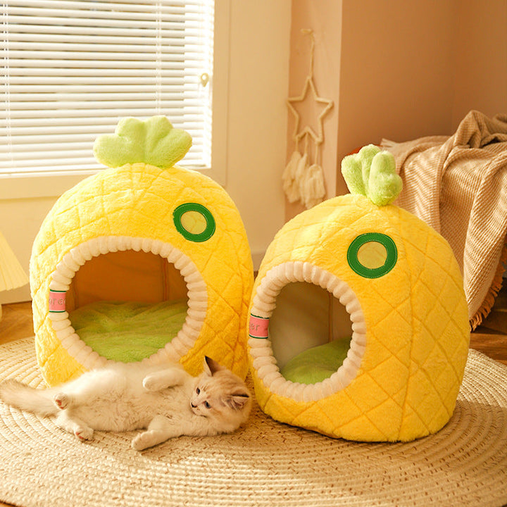 Cozy pineapple cat bed, a warm sleeping cave for pets with soft cushion and fruit design.