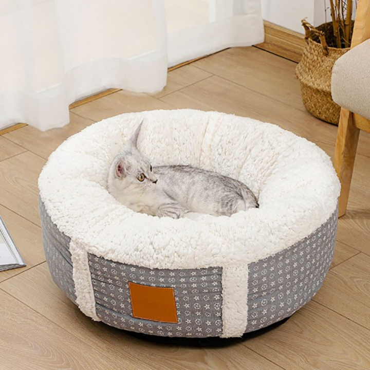 Luxurious plush pet bed, ideal for cats and small dogs, providing warmth in winter.