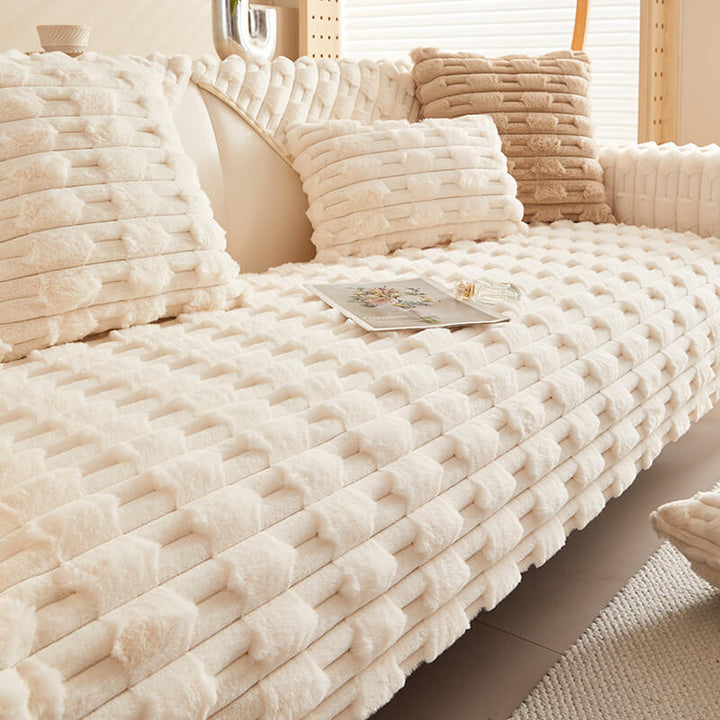 Stylish striped couch cover in soft plush fabric, designed for ultimate comfort and furniture protection