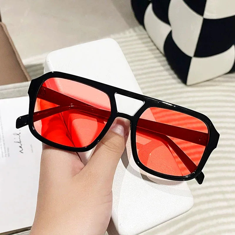 Fashion-forward women's retro square sunglasses. Vintage shades with UV400 for chic style.