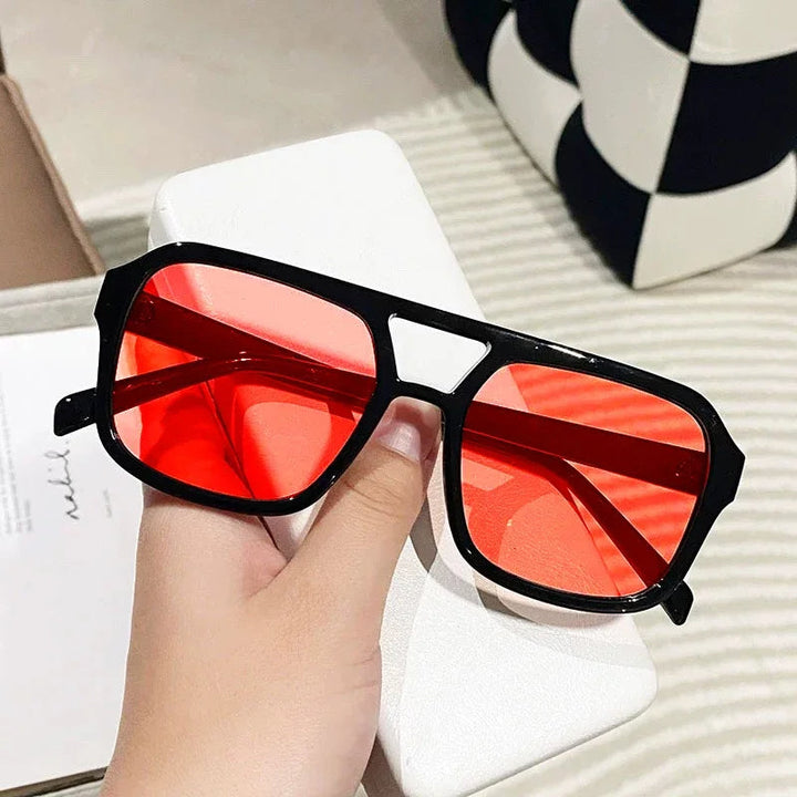 Fashion-forward women's retro square sunglasses. Vintage shades with UV400 for chic style.