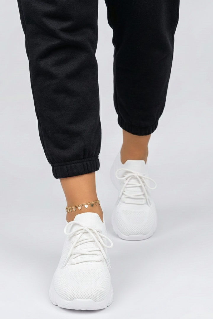 Pair of women's everyday lace-up comfort sneakers, versatile for casual wear and light athletic activities.