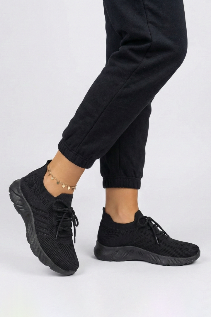 Durable women's sports shoes, lace-up style, offering everyday comfort for walking and active use.