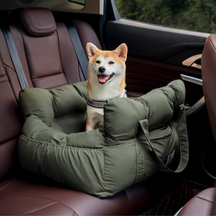 Dog travel booster, dark grey, with car seatbelt pass-through slots.
