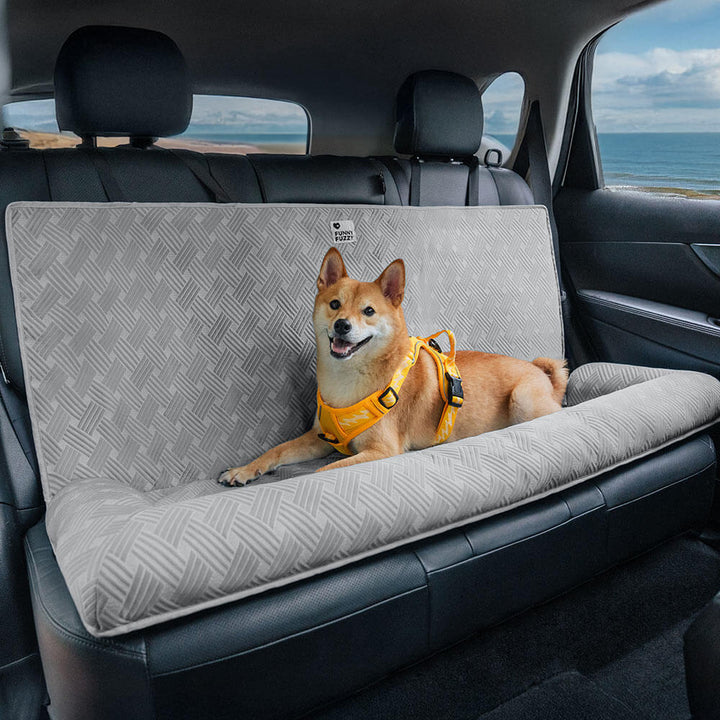 Pet comfort: A large dog looking relaxed and secure in the Dog Cooling Travel Bolster Car Seat Bed.