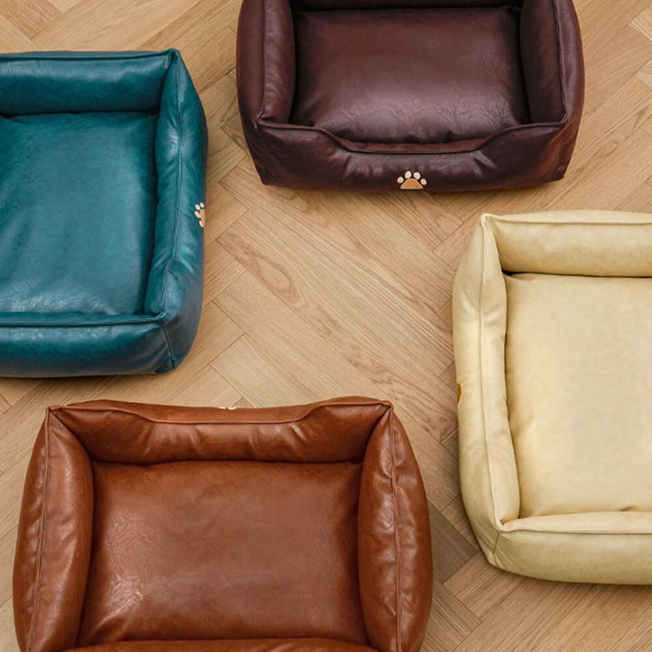 Stylish dog bed, waterproof brown faux leather with soft bolster for pet comfort and support