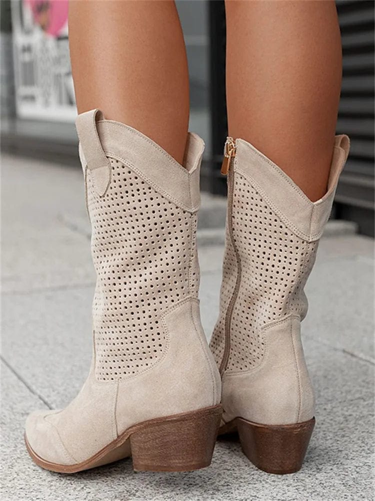 Women's western boots with a comfortable block heel, side zip, & fashionable perforated details, perfect for any outfit.