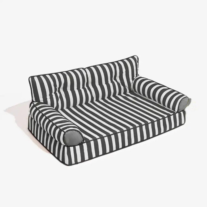 Plush orthopedic dog sofa bed, striped design for ultimate pet comfort. Water-repellent & easy clean indoor dog lounge.
