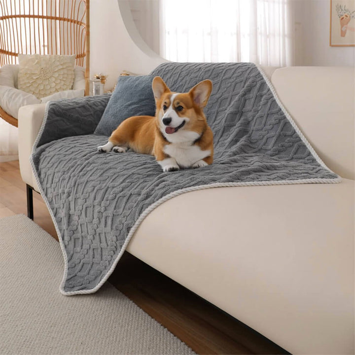 Soft gray fleece dog blanket, waterproof & washable, for ultimate pet comfort & furniture protection.