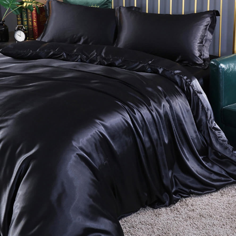 Complete luxurious cooling satin sheet set: fitted sheet, quilt cover, pillowcases. Double-sided for ultimate sleep comfort.