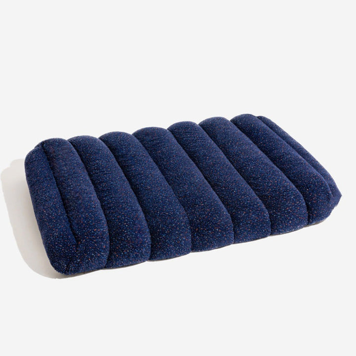 Orthopedic large flat dog bed in creamy for pet comfort. Washable design, perfect as a crate mat or lounge.