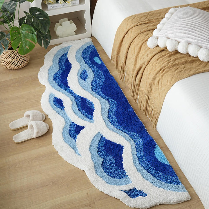 Modern luxury hand-tufted area rug featuring a unique 3D wave design. Elevate living room decor with this textured carpet.